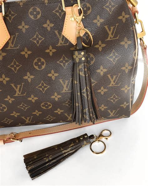 louis vuitton bag with tassel|louis vuitton lv.